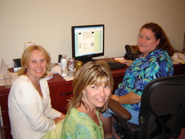 The reunion committee hard at work in Andys home office.  Karen Harris, Janine Smith and Sue Berryhill Trotman